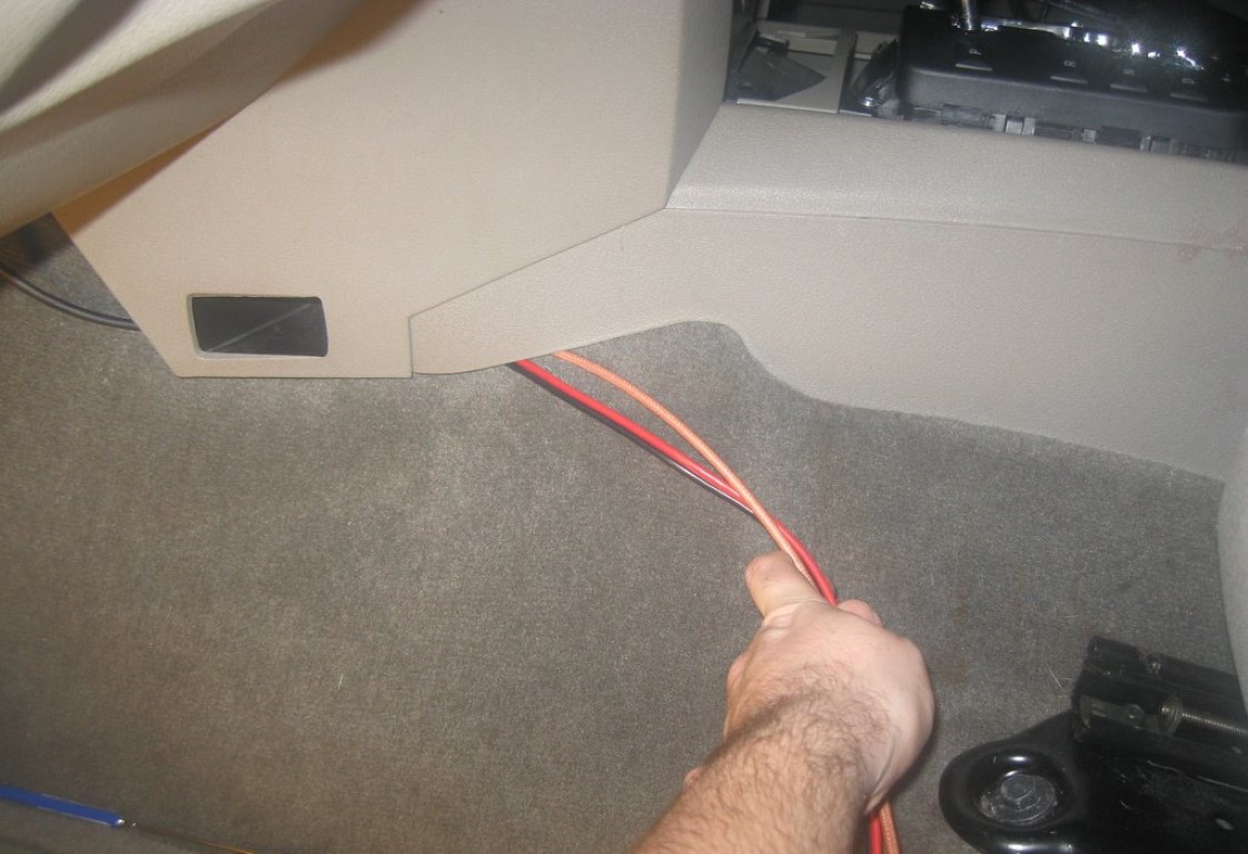 Stuffing the power wires and coax under the edge of the center console.