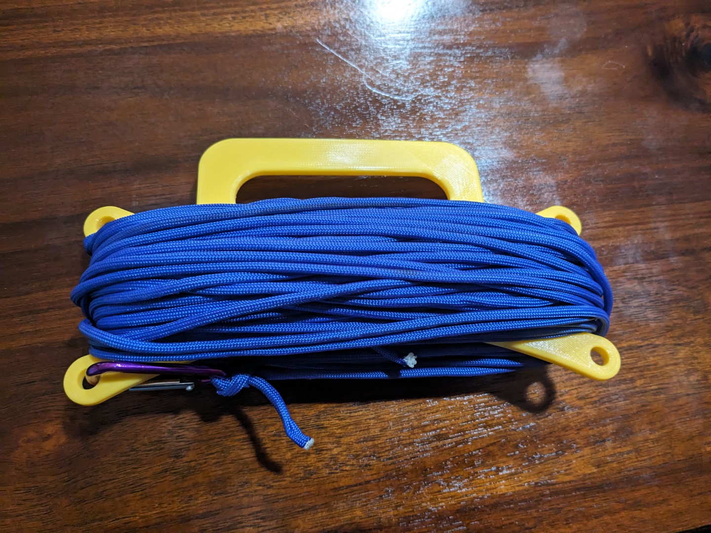 A completed winder, ready with rope.