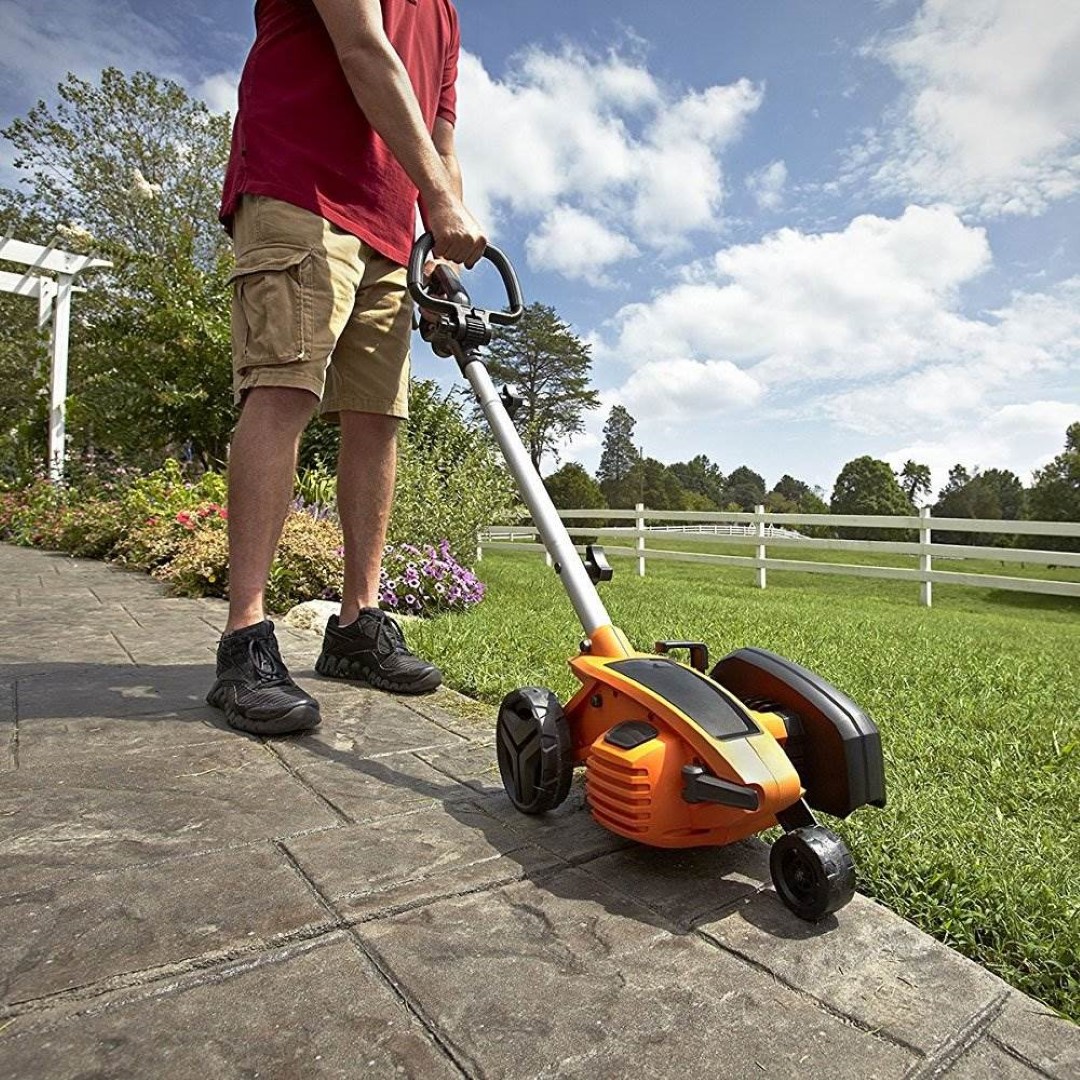 A lawn edger for trimming the lawn.