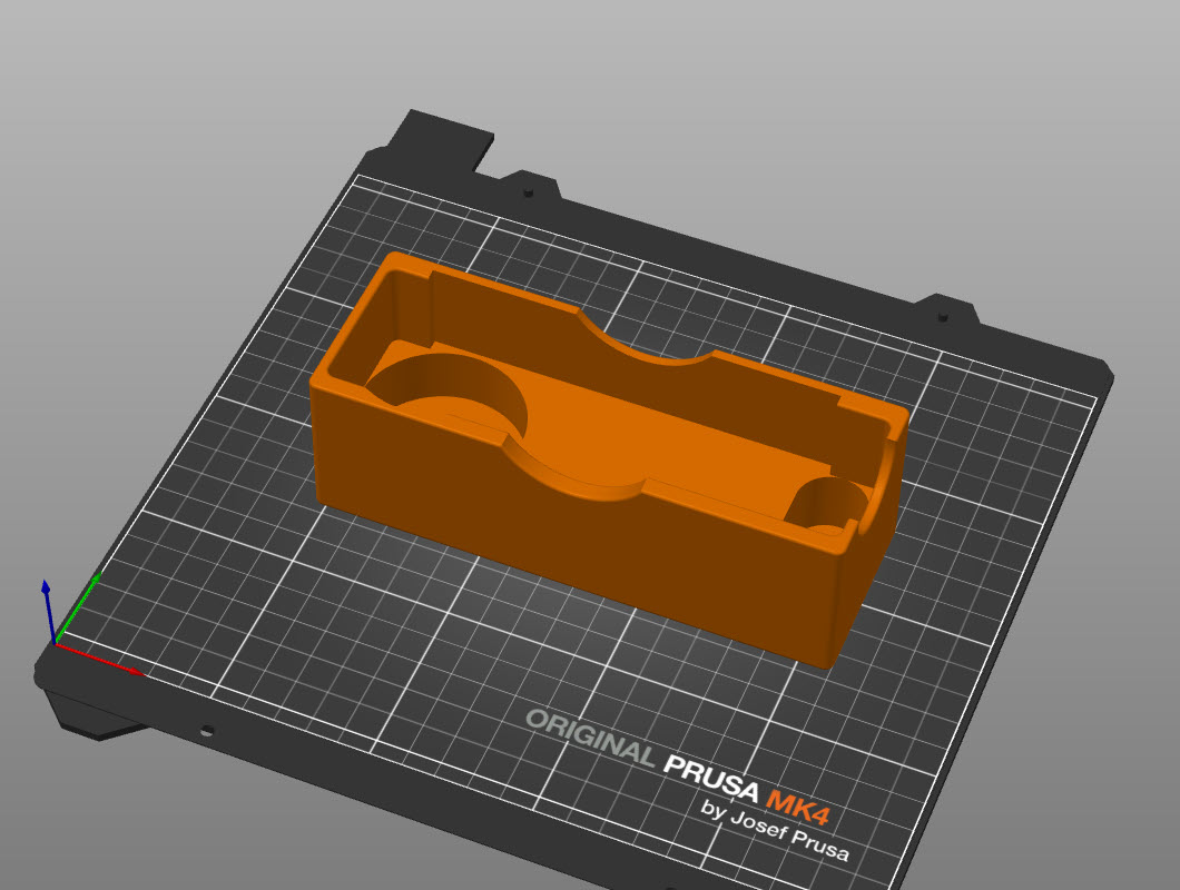 The protective cover model on the bed of the slicer, getting ready to be sliced.